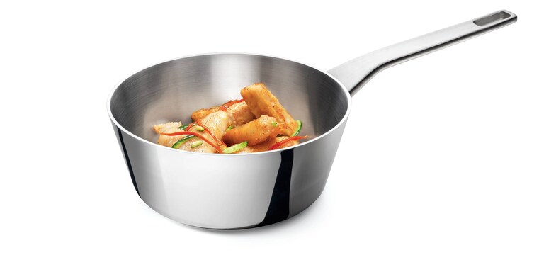 The Conical Sauté cooking some meat